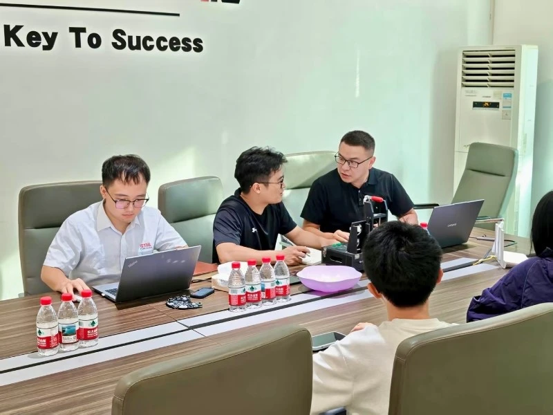 STHL Sales and Engineering ODM Training Discussion STHL team members discussing ODM project stages and customer requirements during an internal training session
