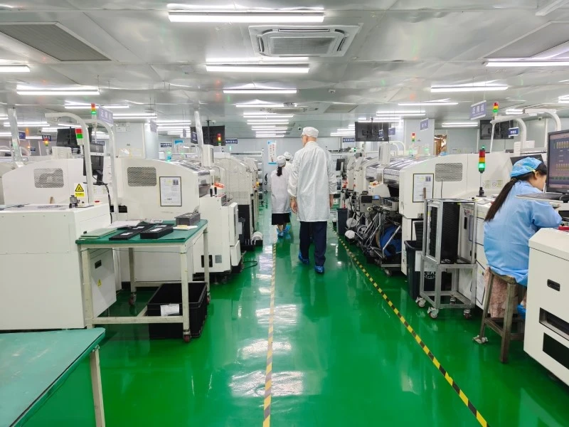 STHL Factory Visit - SMT Production Line Tour Visitors touring the SMT production lines at STHL's Shenzhen factory